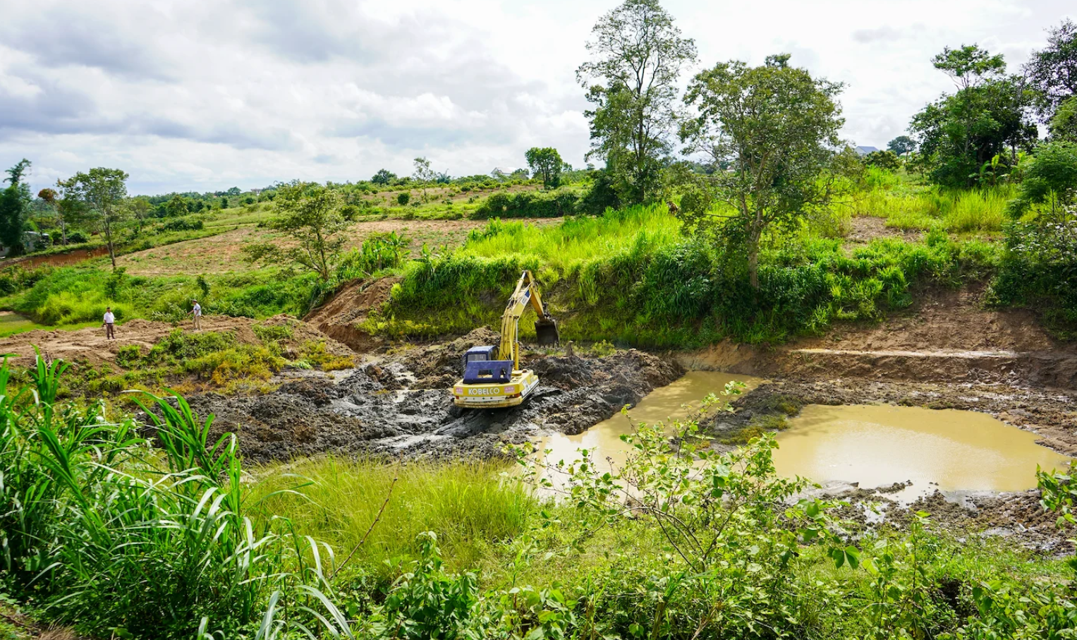 A pond is being excavated in Viet Nam.