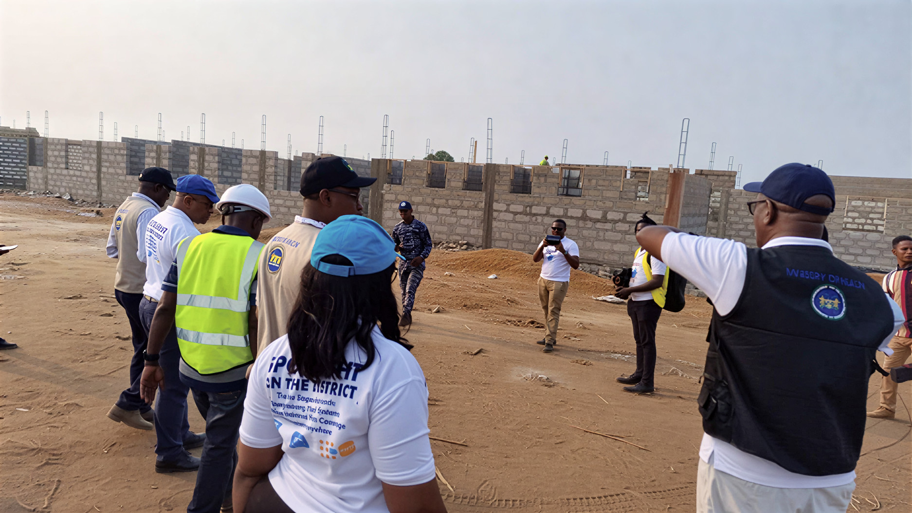 Government employees in Sierra Leone at a project site.
