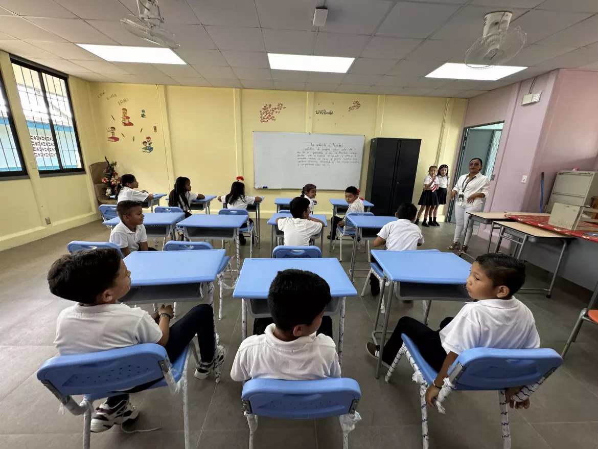 Students in Costa Rica sit in a classroom.