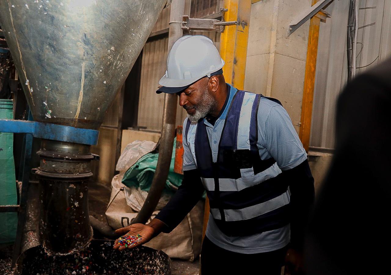 The Resident Coordinator in South Africa in a factory.