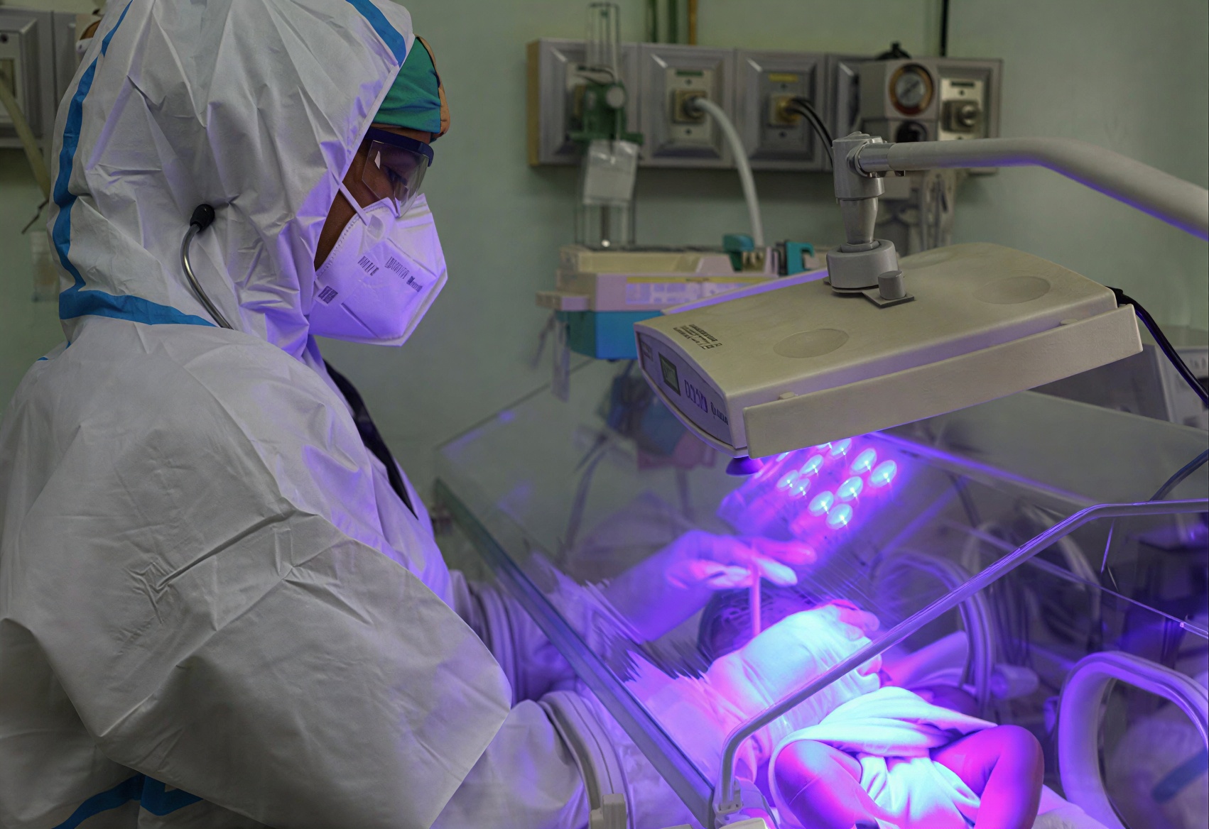 A doctor in Cuba in a neonatal ward.