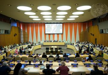 wide angle shot of meeting room with orange background 