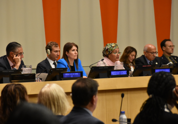 panelists, including the Deputy-Secretary General sit in the ECOSOC chamber addressing Member States and Resident Coordinators