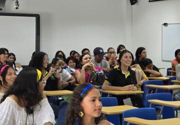 A group of young students in a classroom.