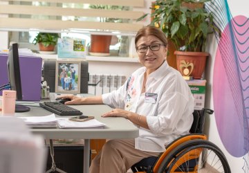 A woman in Kazakhstan uses her computer.