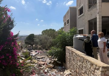 The UN Resident and Humanitarian Coordinator in Lebanon observes damages with partners.