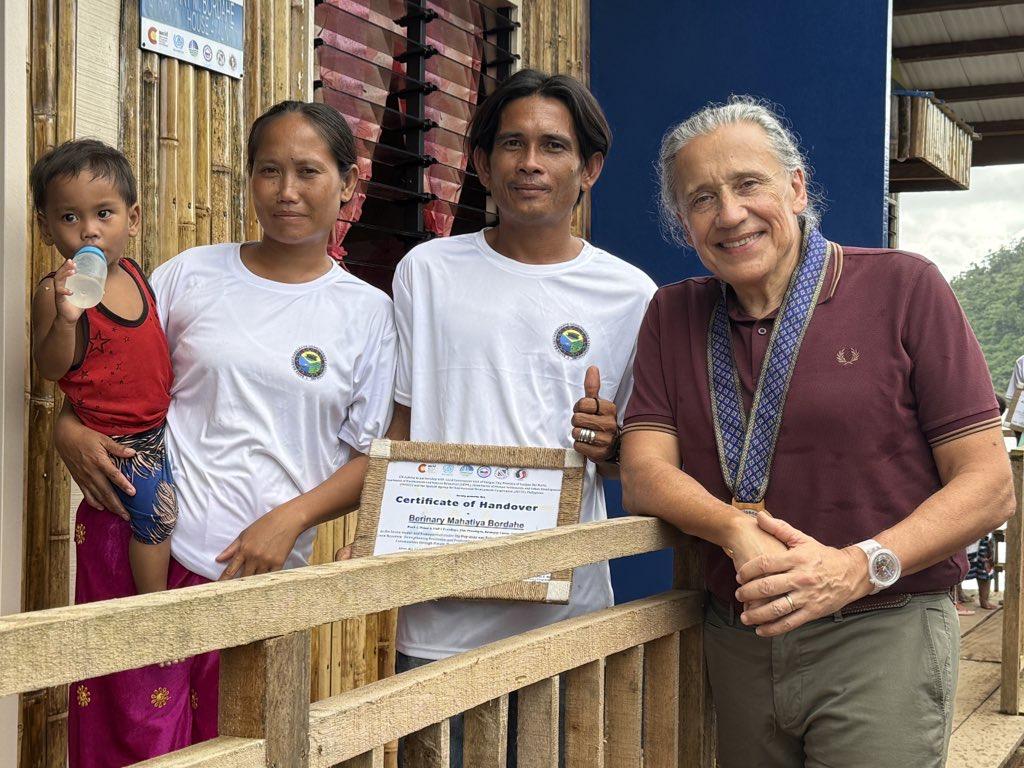 A family with the Resident Coordinator