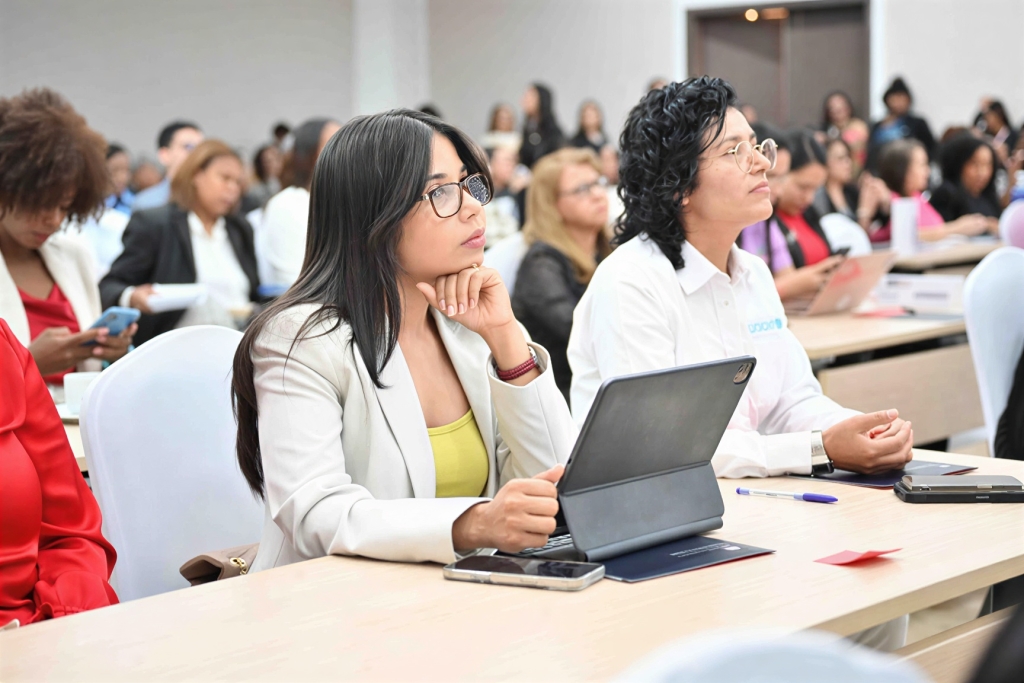 A young woman participates in a conference in the Dominican Republic.