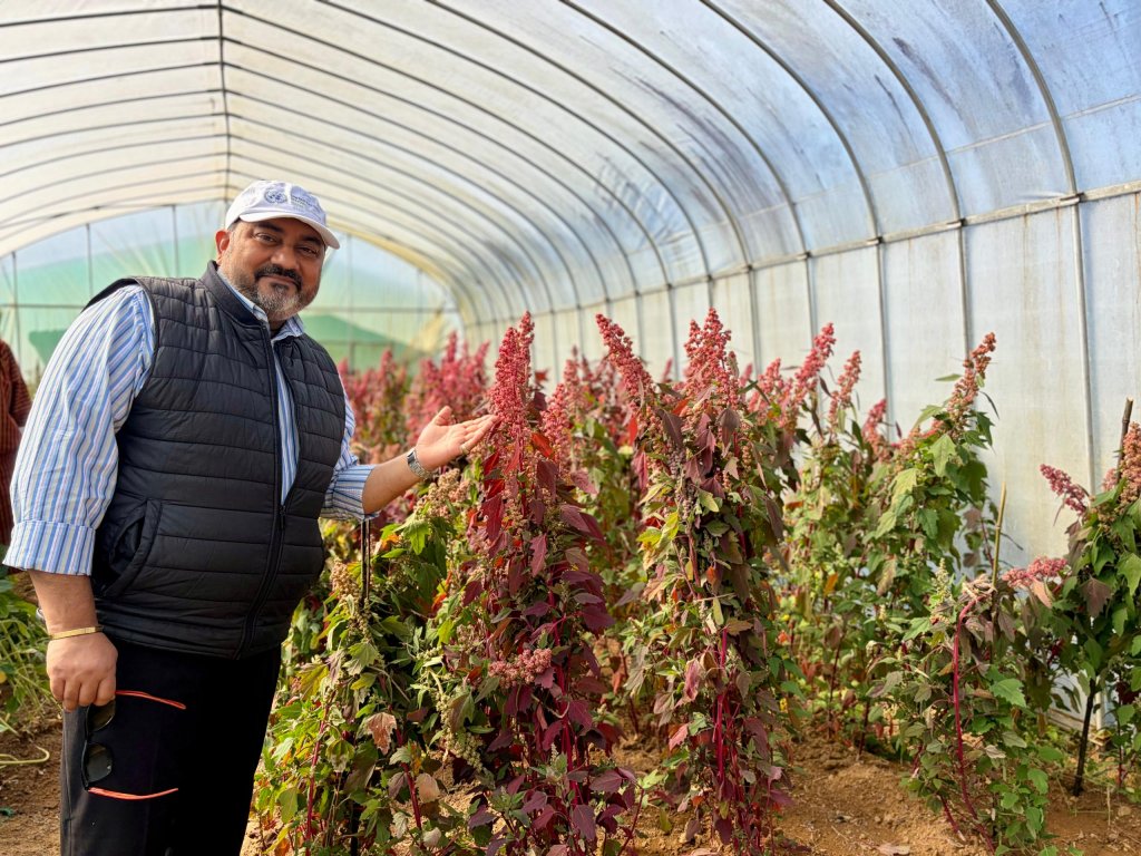 The UN Resident Coordinator in Bhutan visits an agricultural project.