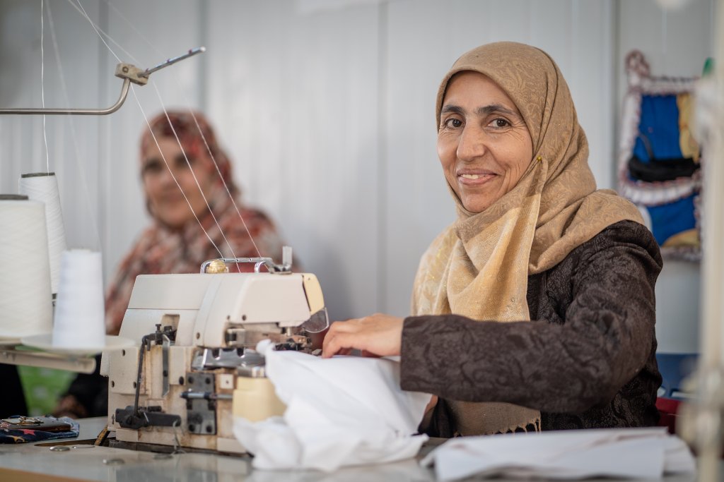A Syrian refugee during a tailoring programme in Jordan.