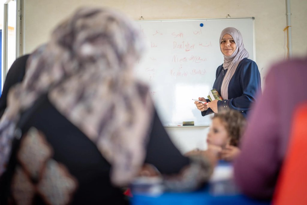 A Syrian refugee gives a lesson in Jordan.