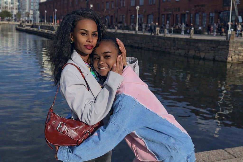 Two refugees embrace in Egypt.