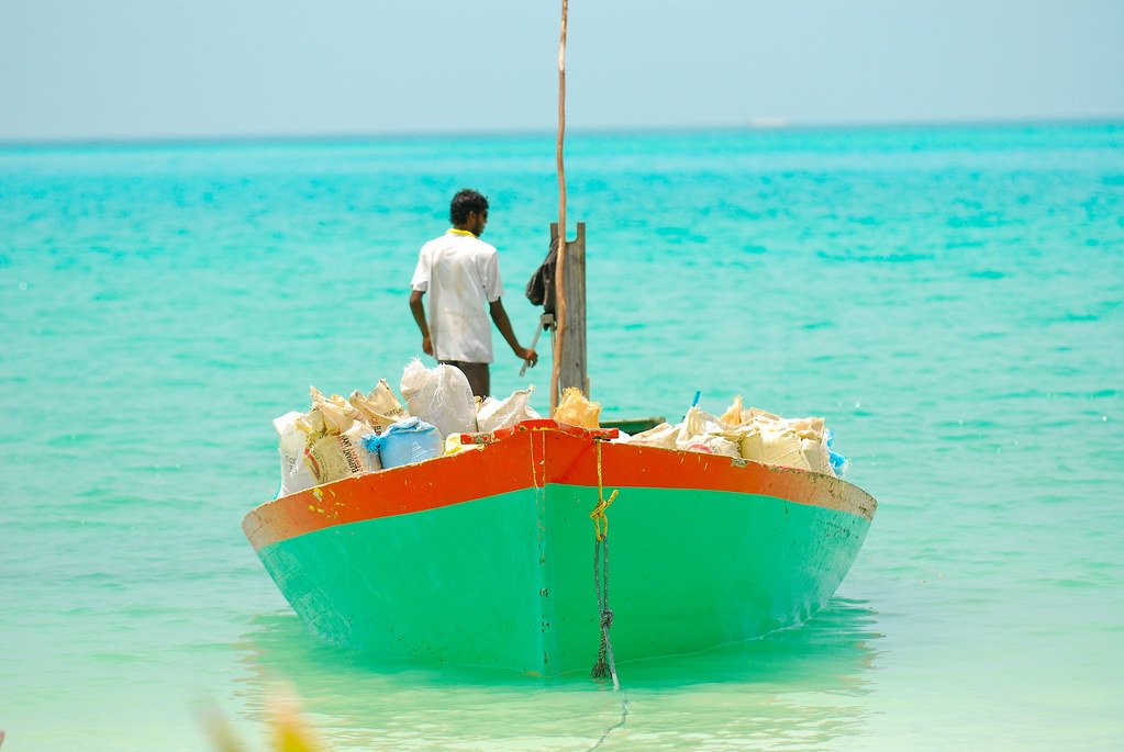 A man on a boat in the Maldives.
