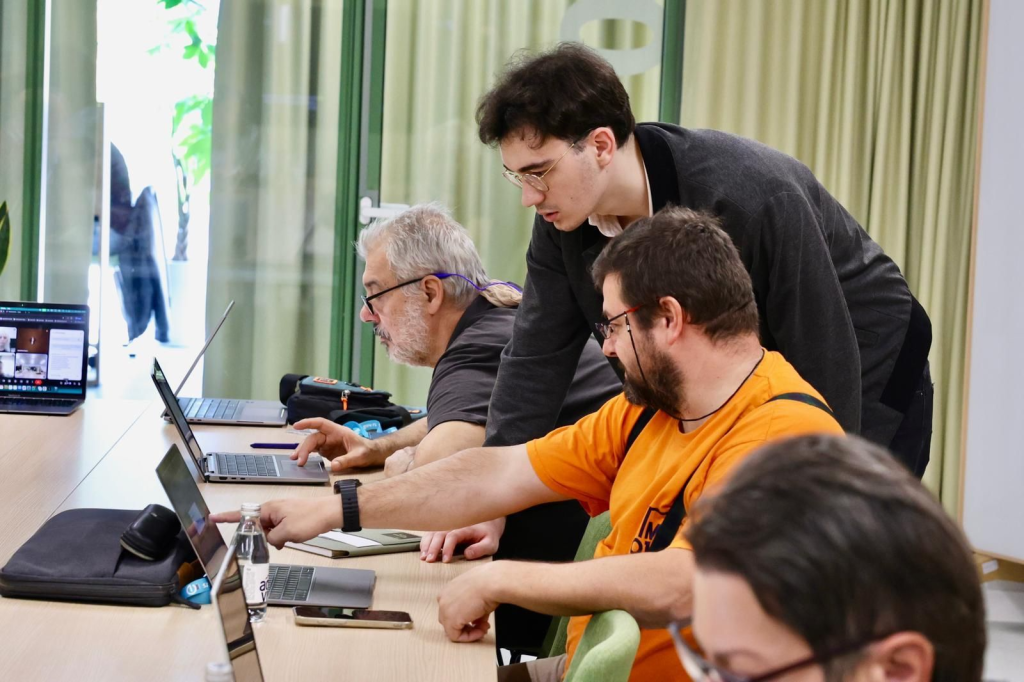 People in Serbia test public services on laptops.