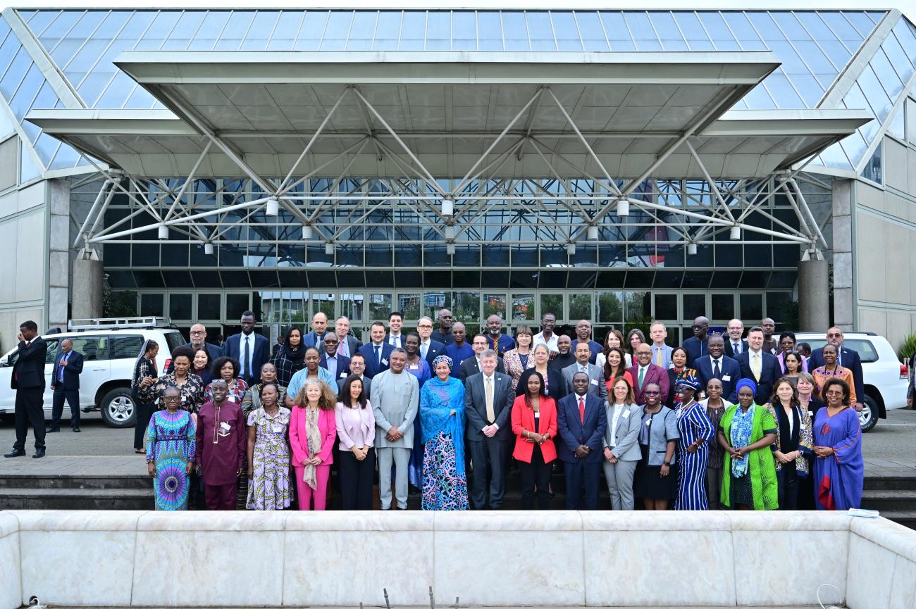 A group of RCs in an outdoor setting standing in a group picture looking at the camera