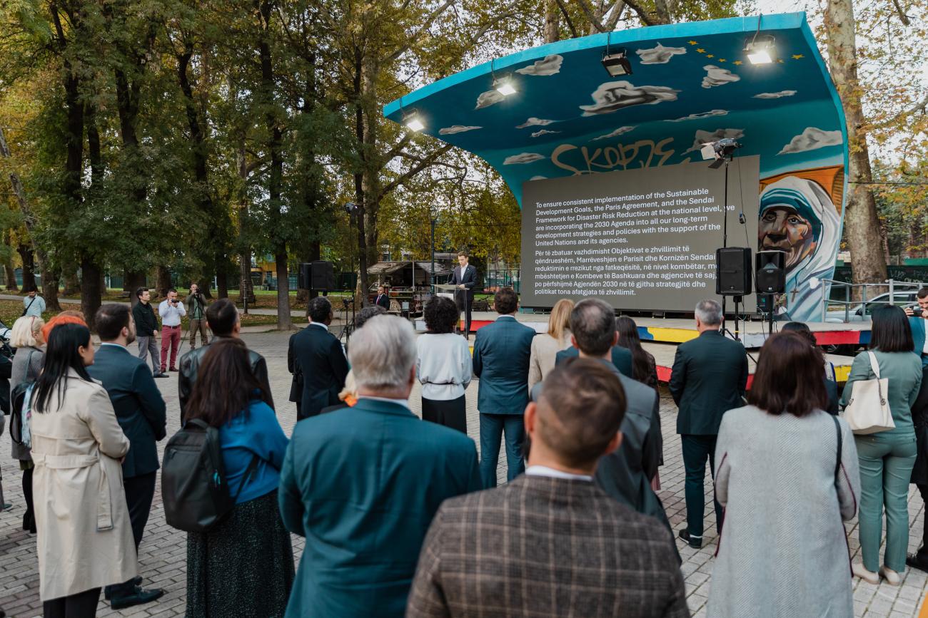 A group of people in an outdoor space before a consultation on the North Macedonia development strategy 