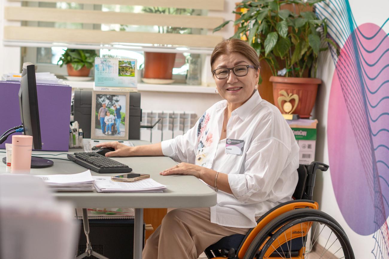 A woman in Kazakhstan uses her computer.